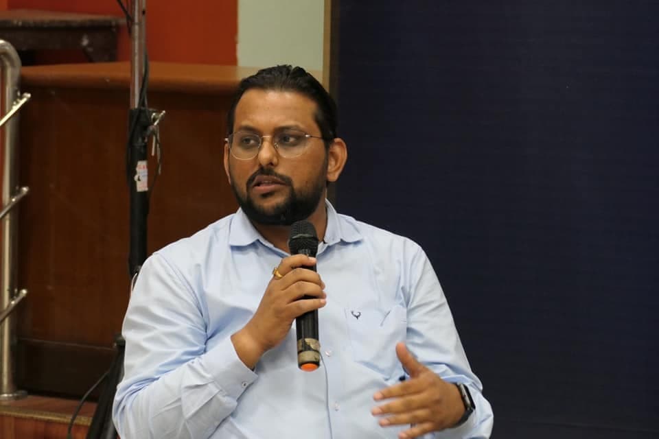 Dr. Niraj Jha treating patients